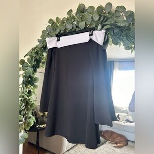 Strapless black A-Line Women’s mini dress with White band at the shoulders